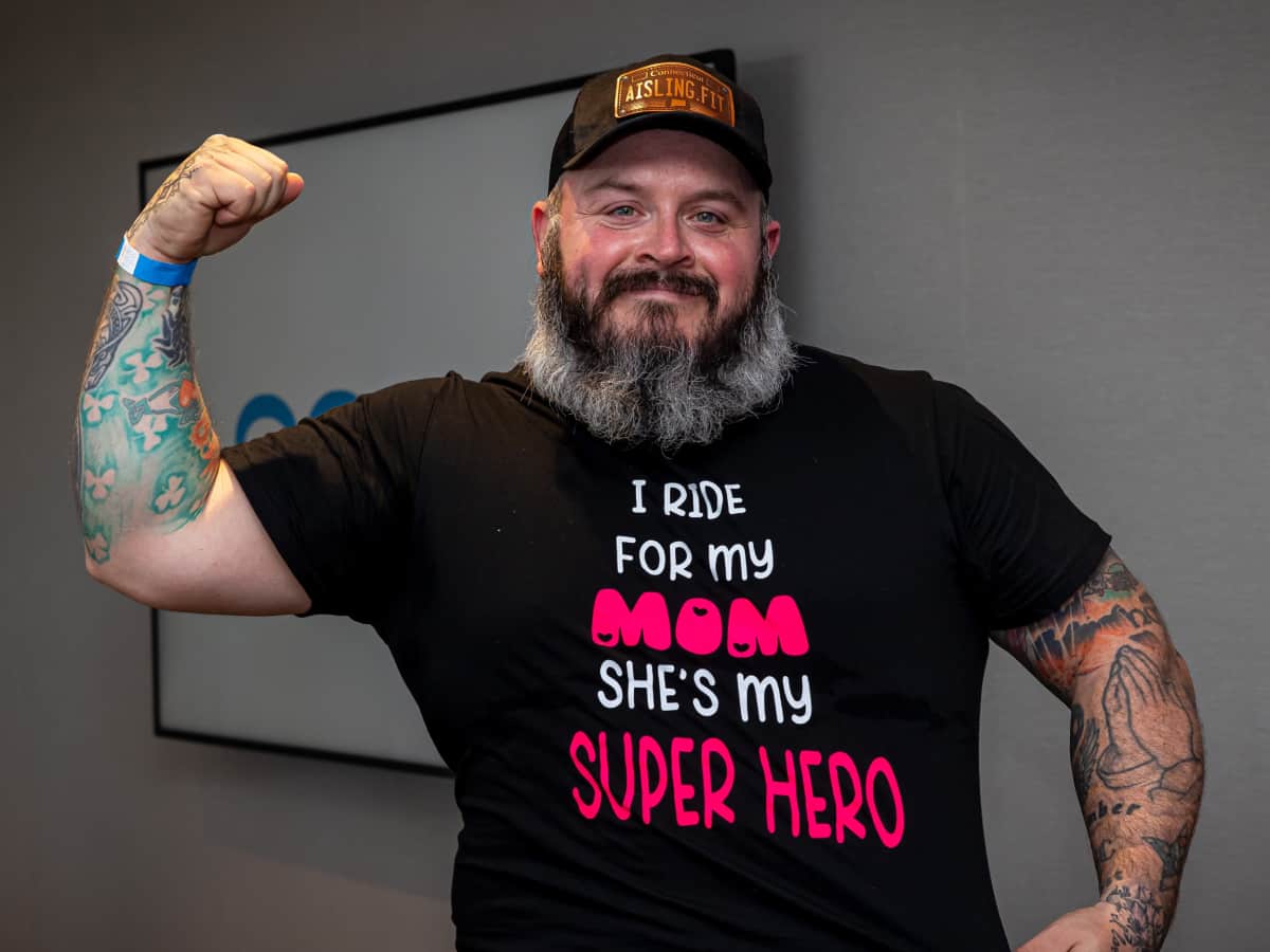 PMC Winter Cycle rider wearing a shirt that says he is riding for his mom